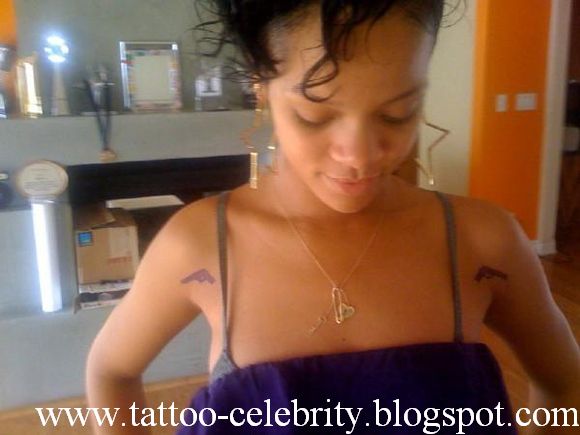 rihannas tattoo. rihanna tattoos and meanings.