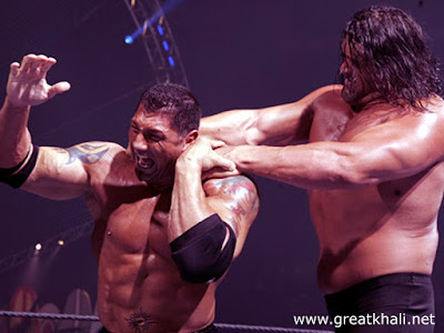Image : WWE wrestlers Triple H and Great Khali
