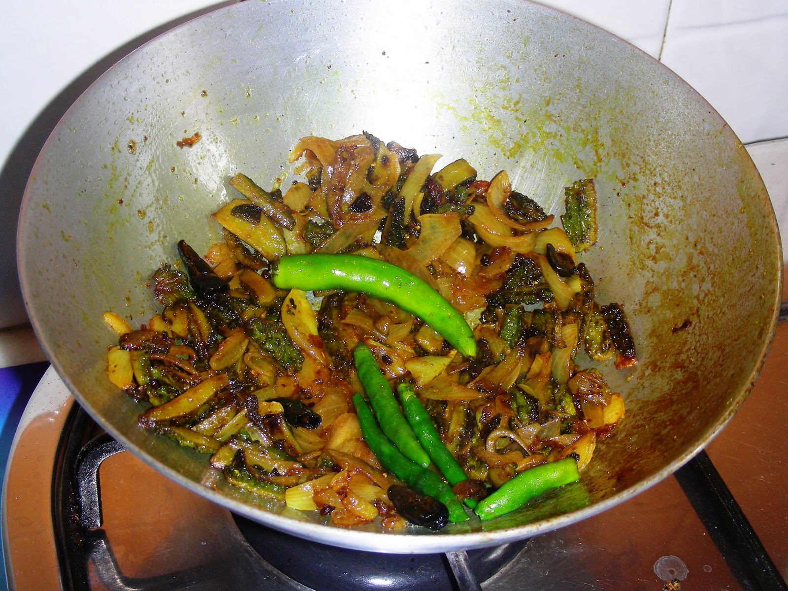 COOKING AND RECIPES KARELA ONION FRY WITH METHI AND RED CHILI