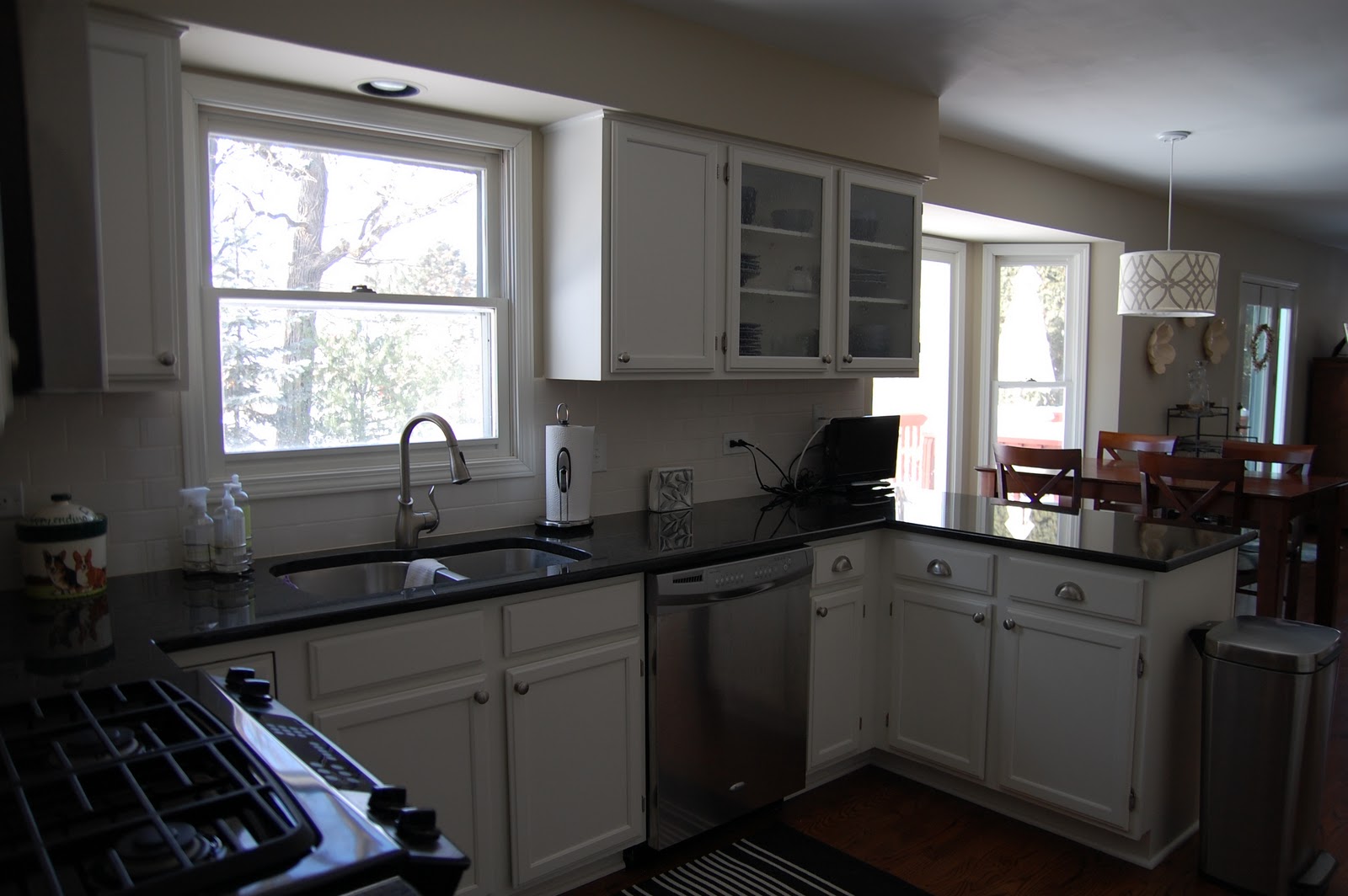 Backsplashes for white kitchens Black Pearl Granite with White Cabinets