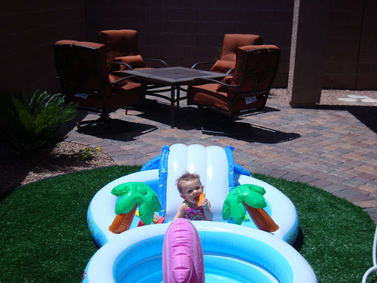 This is my new pool and our new patio and turf!