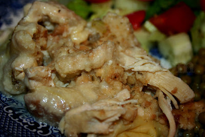 Chicken and dressing made with a whole cooked chicken, a homemade herb dressing and homemade gravy.