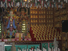 Lots of Buddhas inside temple