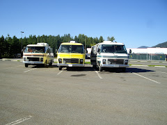Three Little GMCs in the Walmart parking lot.