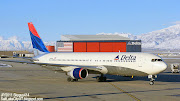 DELTA AIRLINES Boeing 767 Airplane (delta air lines dl at salt lake city int airport with delta hangar also shown)