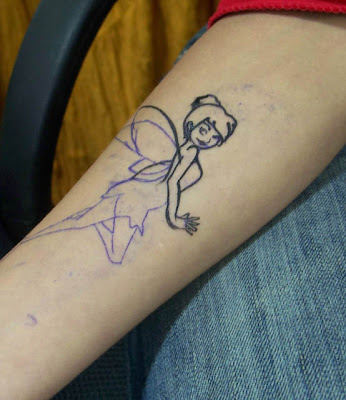 My Tinkerbell tattoo done in 06' Another tattoo design which is very popular 