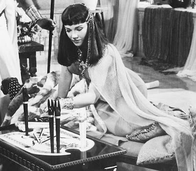 Anne Baxter in The Ten Commandments. She's probably breaking three or four of them right here.