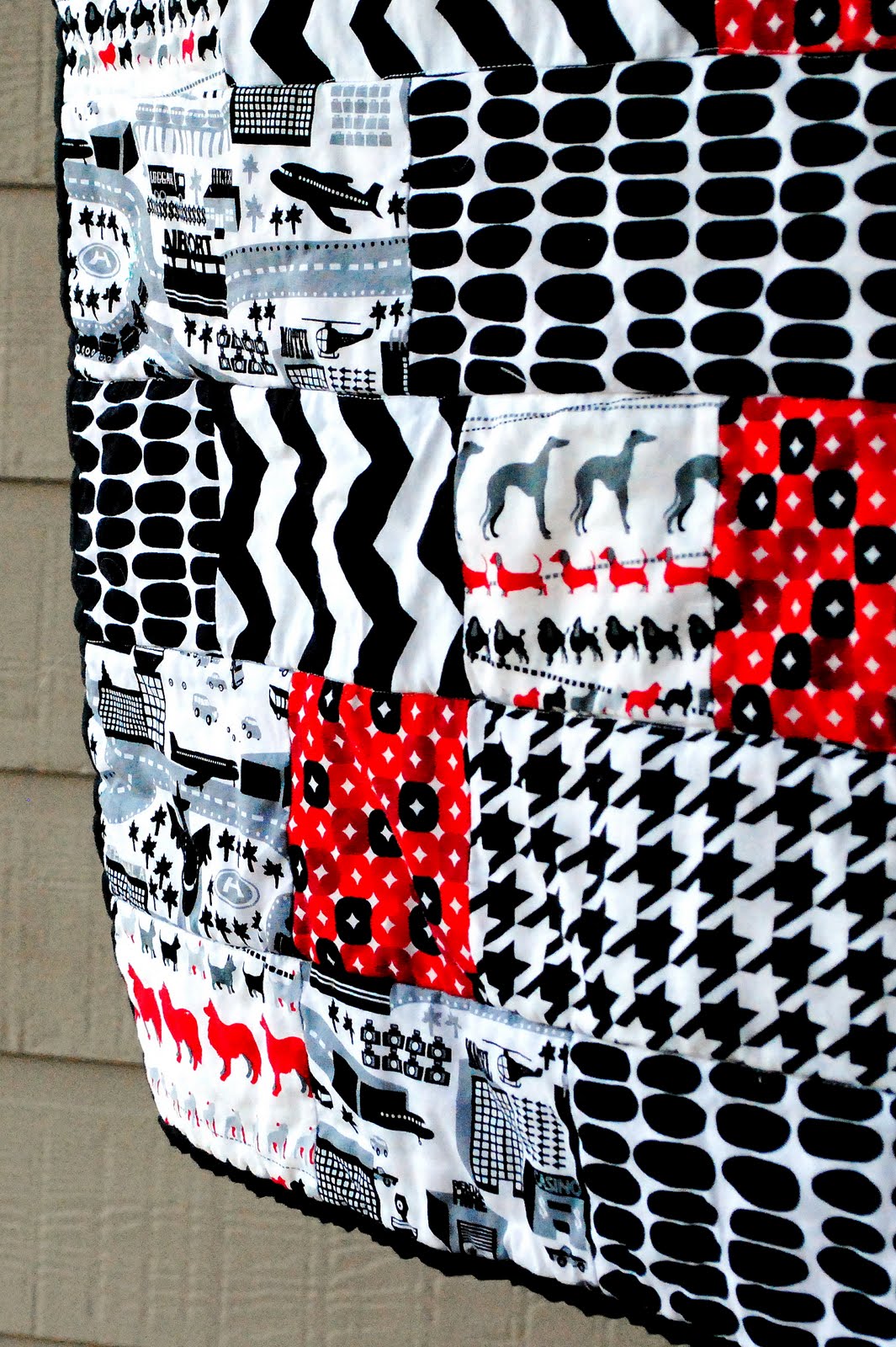 The Stepford Wife Stimulating Black, White, and Red Baby Quilt