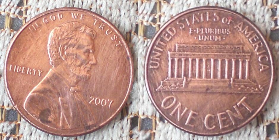 This one cent coin shows the Lincoln head on the obverse and the Lincoln 