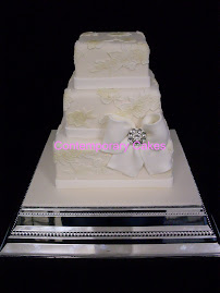 3 tier square stacked cake with vintage sugar lace applique.