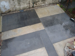 RODRIGUEZ NUMA ARQUITECTURA: Piso de cemento alisado bicolor con junta