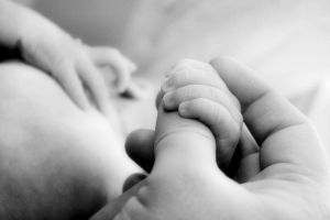 [1111673_little_baby_hands_with_mom_and_dads_hands_3[1].jpg]