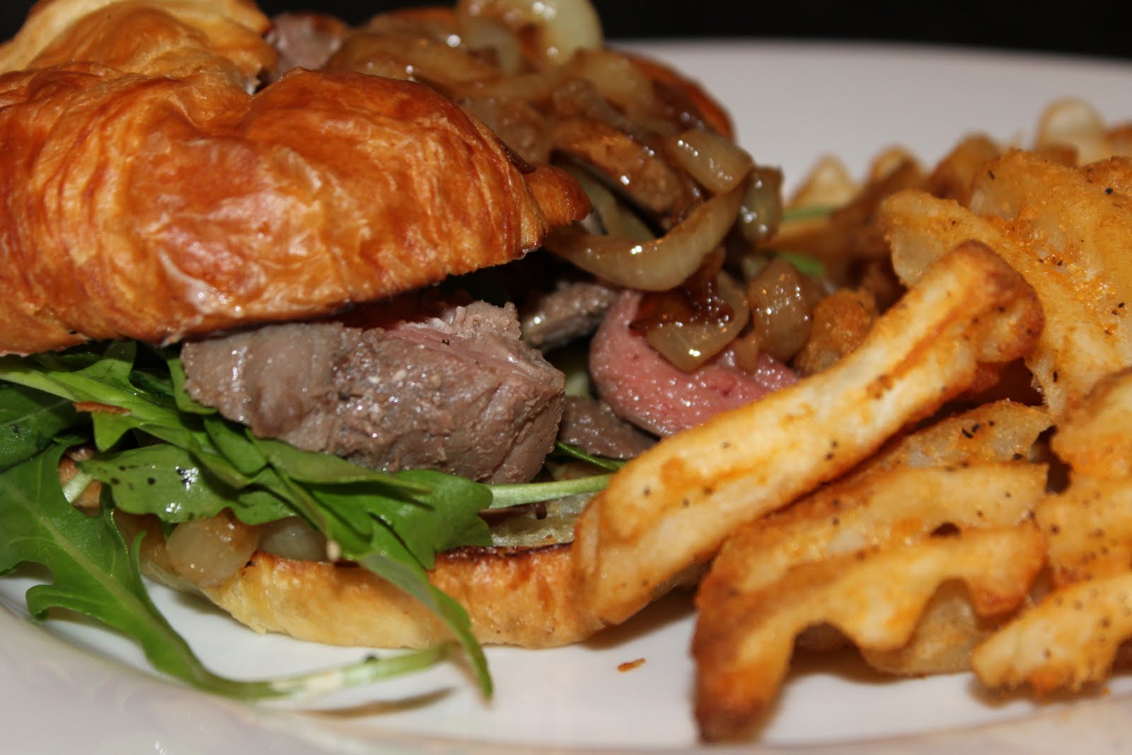 Kitchen Snaps Croissant Steak Sandwiches with Caramelized Onions and