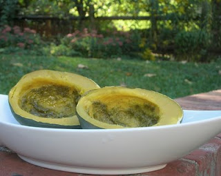 Acorn squash cooked in the microwave, brushed with basil pesto