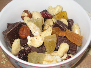 One serving of high iron trail mix in a bowl.