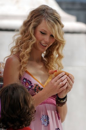 Taylor Swift Eating Something. 2011 though taylor swift is