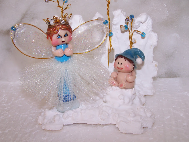 Baby Bella and Bianca (Polymer Clay) Snow effect created with Chalk powder and Styroform balls...