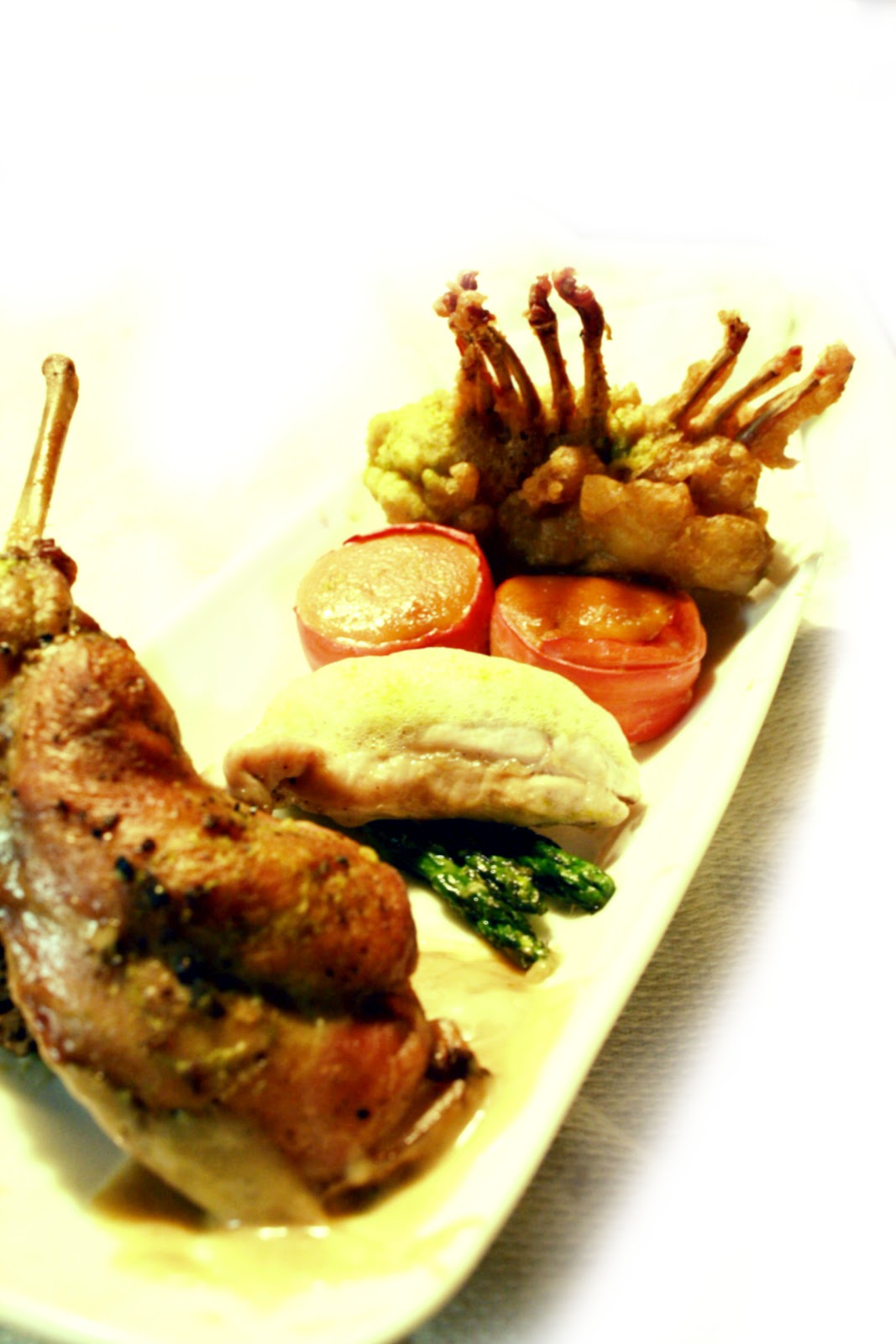 commiskaze Rabbit Braised Leg with Morels, and Rabbit Cream Sauce, Garlic Olive Oil Poached