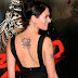Actress Lena Headey flower tattoo design