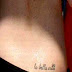 Lindsay lohan peace tattoo sign