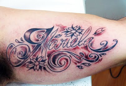 tribal letter tattoo