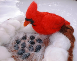 Cardinal in a Snowy Bird Feeder