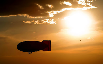 hot air balloon near to the sun