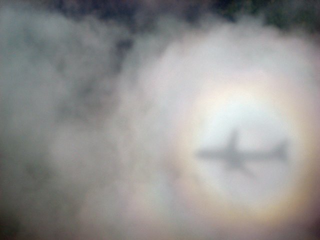 Shadow of My airplane in the clouds! Rainbow included, I was pretty amazed