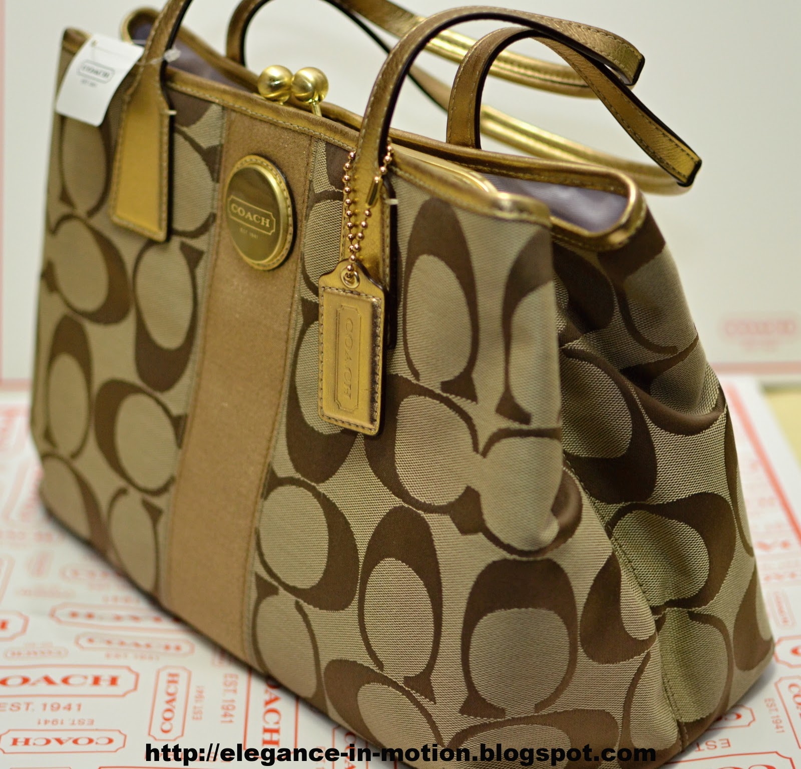 Elegance in Motion Coach Signature Carryall Khaki /Metallic Gold