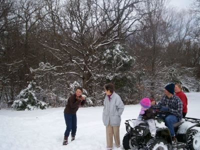 Niece getting hit with snowball!