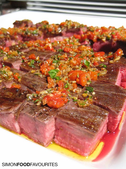 [20100216_6667-March-Into-Merivale-Launch_Mad-Cow-Grilled-rangers-valley-wagyu-flank-steak-with-chimichurri-sauce.jpg]