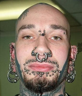 WYR: Tom shave his head and get an avatar tattoo orget piercings like 