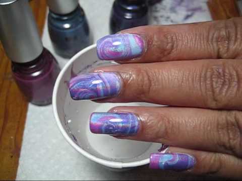 Water marbling uses a very unique process to make your nails look like the
