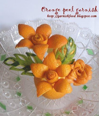 لاترمى قشور البرتقال Orange+peel+flower_garnishfood
