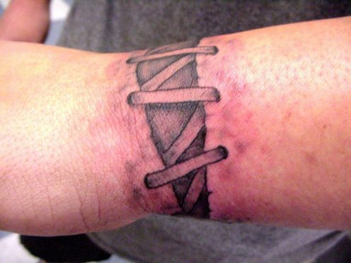 Lavigne star wrist tattoo.
