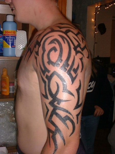 Some of the most common designs used on arm tattoo for men are tribal themes