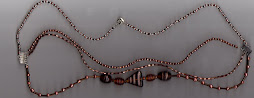 triple stranded brown beaded necklace