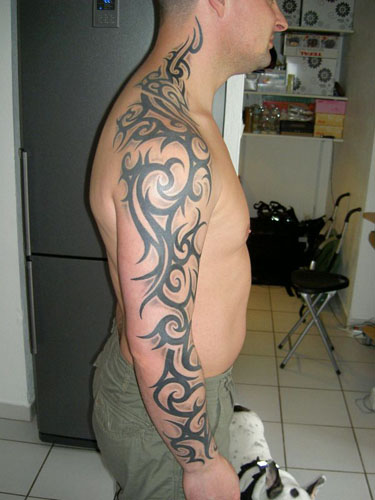 shoulder tribal tattoos. tribal tattoos for men arms.