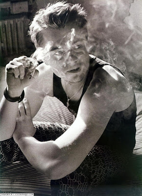 Ryan Phillippe biting a cigarette. Leonardo DiCaprio holding a cigarette