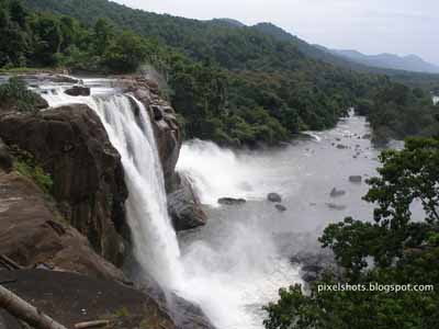 athirapally water falls,kerala tour spots,athirapally thrissur,kerala tourist destinations,waterfalls in kerala,athirapilly aerial view