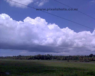 clouds like flying huge mountains in the sky 