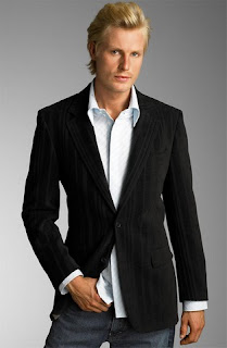 blonde man in suit and jeans