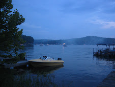 Boats on Lake Thunderbird on the 4th of July at night before the fireworks display