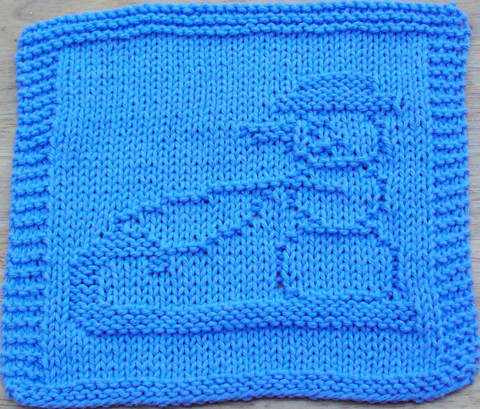 [snowman+on+a+tobbagan.jpg]