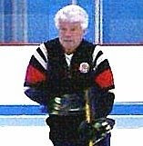 Dennis Chighisola  ("Coach Chic")