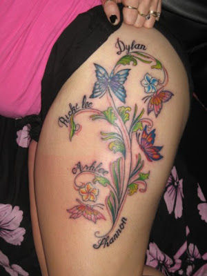 butterfly tattoos for foot. utterfly amp; flowers tattoo on