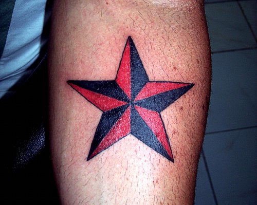 star tattoo on calf