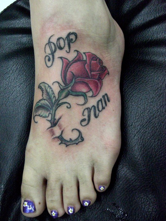 peace and love foot tattoos. love heart tattoos on foot.