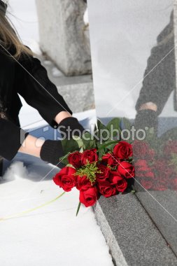 [ist2_8695684-roses-at-a-cemetary.jpg]