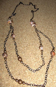 Colar en tons de Bronze e cobre.